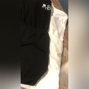 Women’s 2 pack bodysuits one black & one white both size XS New Without Tags!